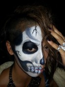 Half skeleton face paint by Cynnamon/Bay Area Party Entertainment
